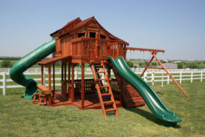 redwood multi-level swing set with cabins swings and slides