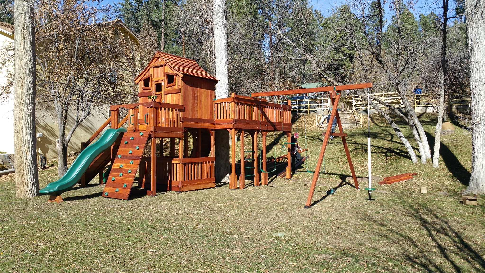 ruidoso new mexico redwood playset with cabin and large tree deck