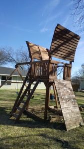 playset, swing set, rock wall, stain service
