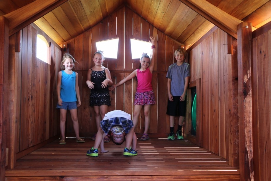 Mansfield, Texas, kids playing inside fort ticonderoga cabin, spacious interior of playset, redwood swing set