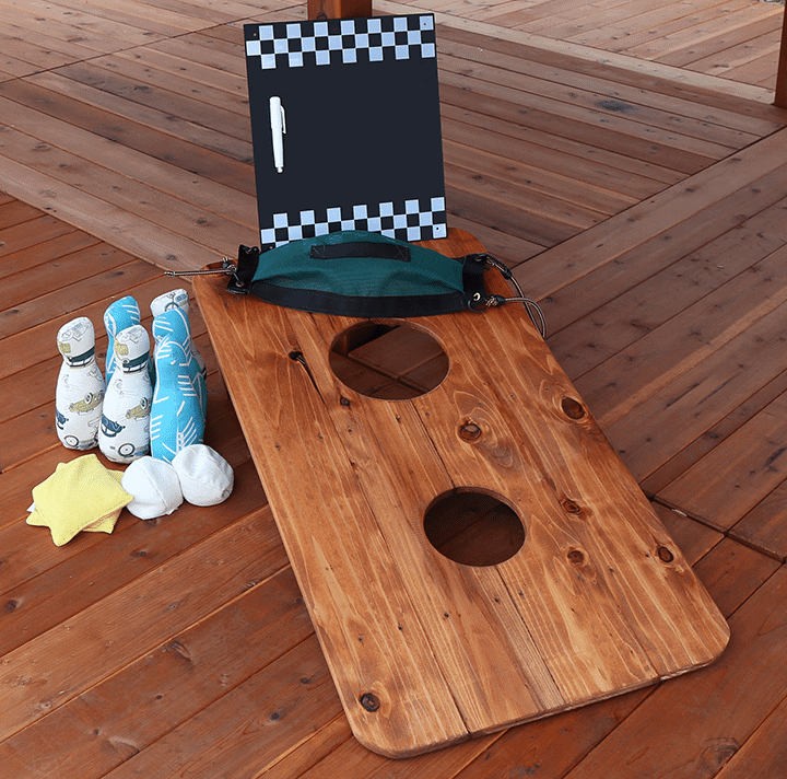 cornhole game with bowling ball option for outdoor playset