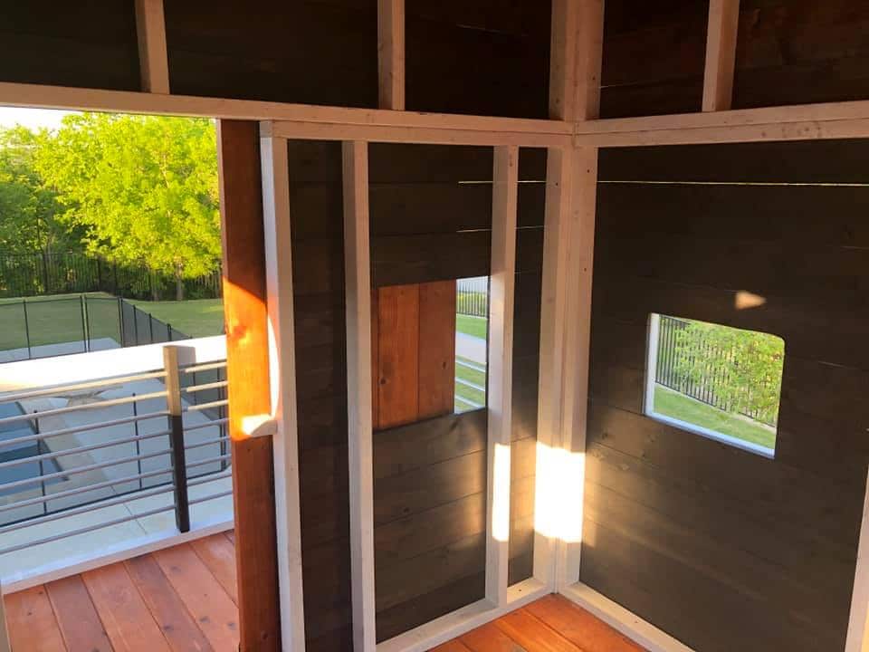 interior walls with ebony stain and white paint framing on our modern design playset