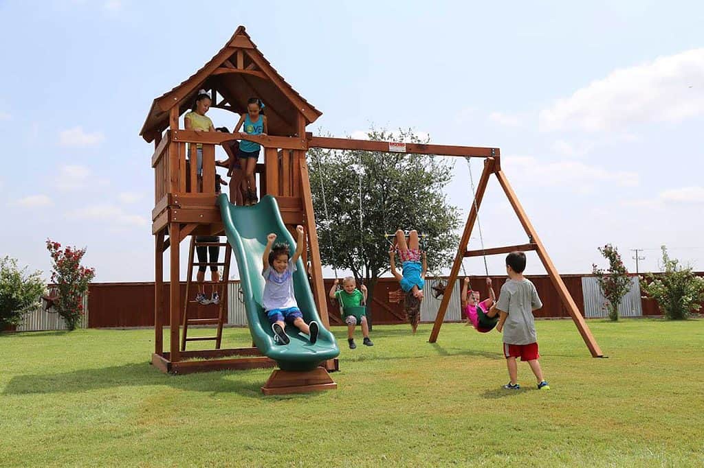 maverick redwood swing set on a 6 foot deck height with slide and swings