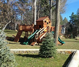 Redwood playset, working with the surrounding landscaping