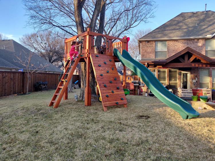 Plano, Texas, custom tree deck with climbers and slides - backyard playground
