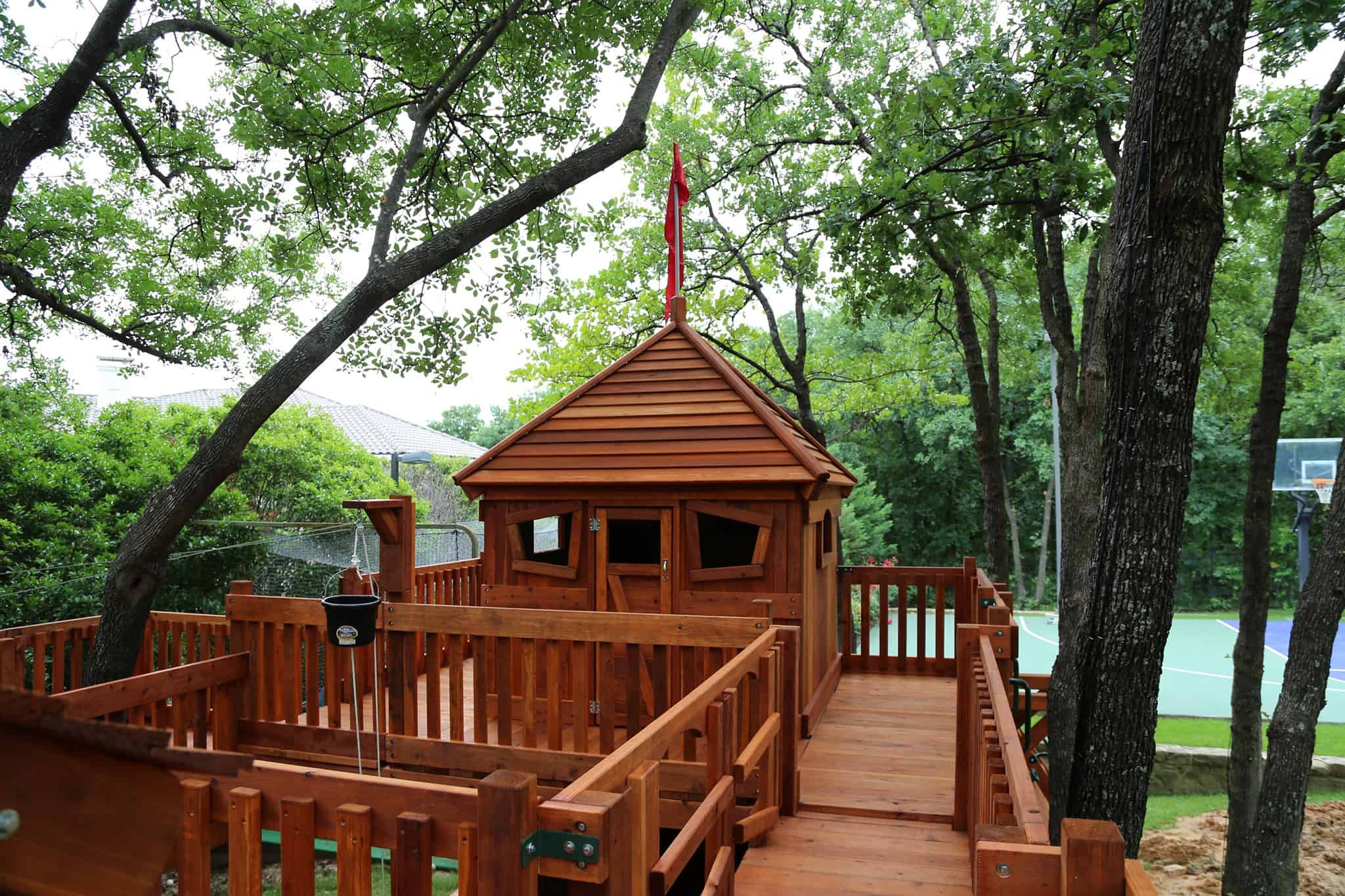redwood bridged playset with princess roof cabin