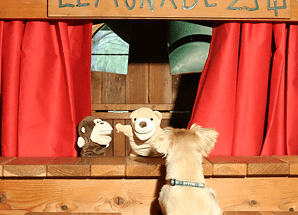 kids puppet theater backyard swing set accessory with a puppy dog for an audience