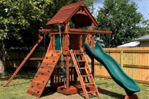 fort davis swing set with rock wall and lower floor