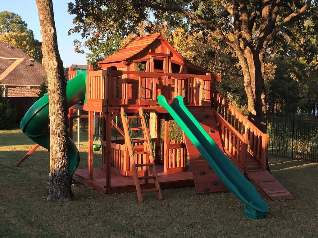 Colleyville Texas outdoor swing set for kids with spiral slide