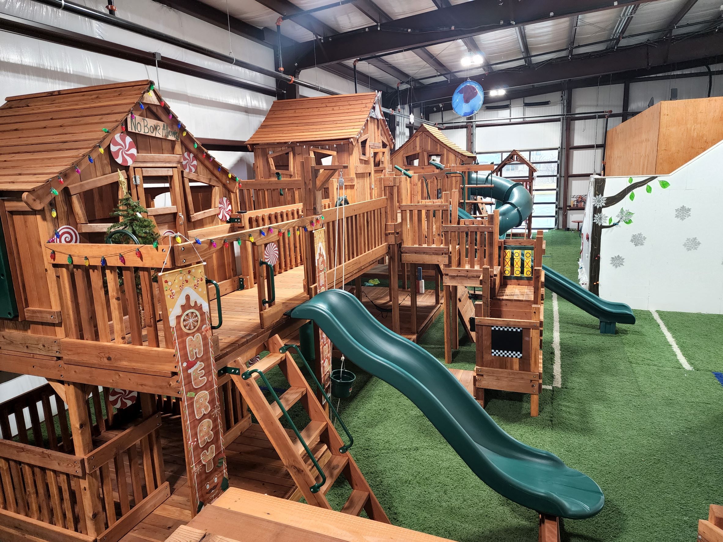 frisco swing set showroom shown decorated for christmas