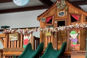 Ticonderoga swing set decorated for Christmas