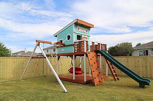 Midlothian, Texas,modern design playset 7' height with aqua and white paint and redwood stain
