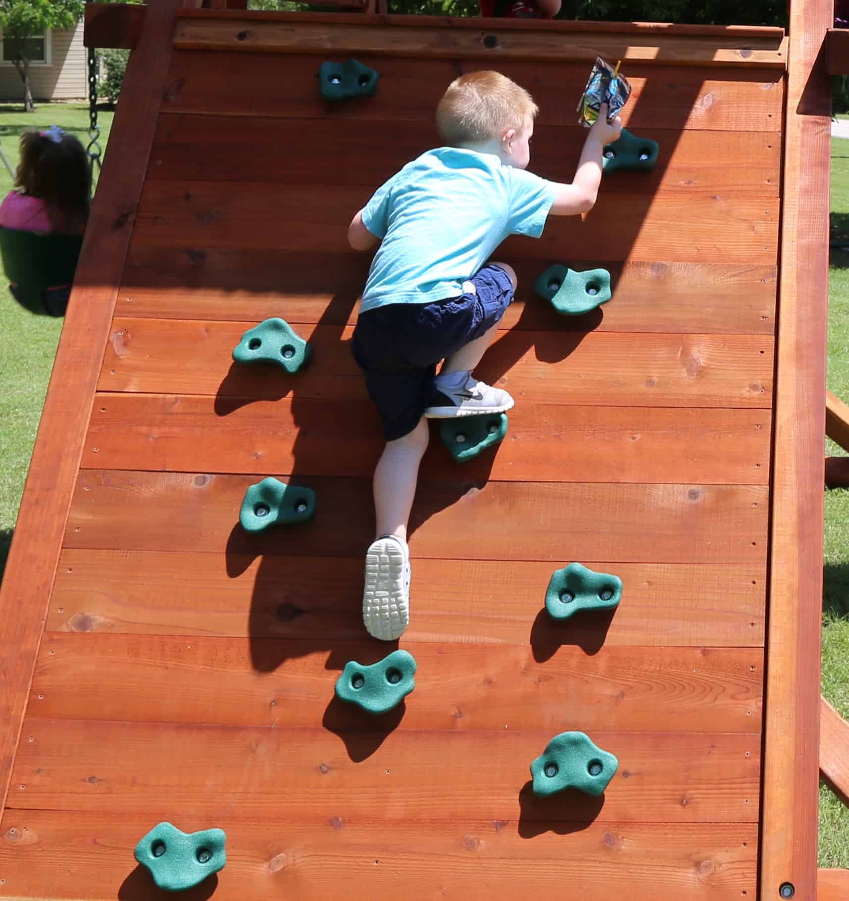 kingwood, texas, accessories little boy climbing rock wall climber on playset