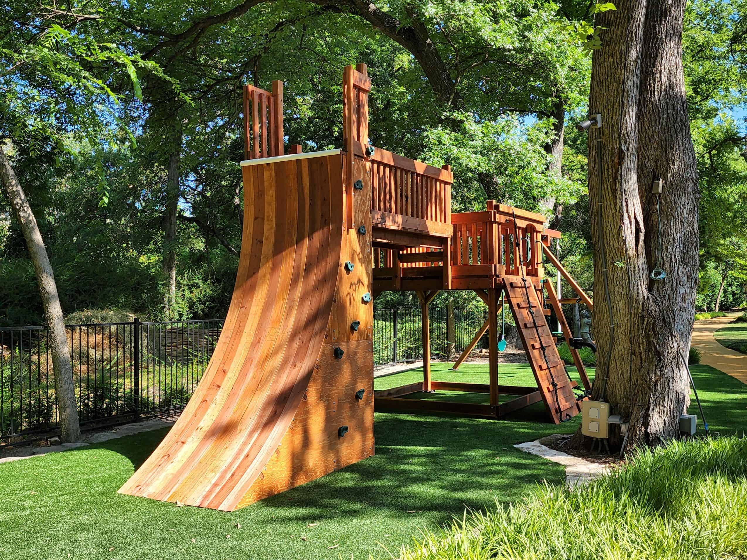 grapevine, texas, warp wall play accessory bridged to open deck with swings and climbers