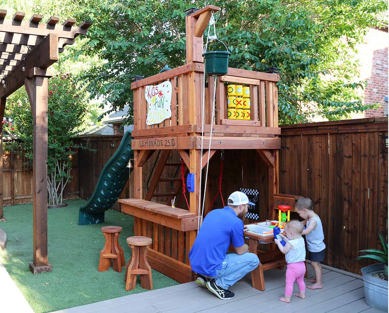 swing set justin, texas, 76247, dad with children playing on Micro-backyard play set
