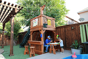 micro-backyard playset, redwood with toy accessories, sensory table, and lemonade counter