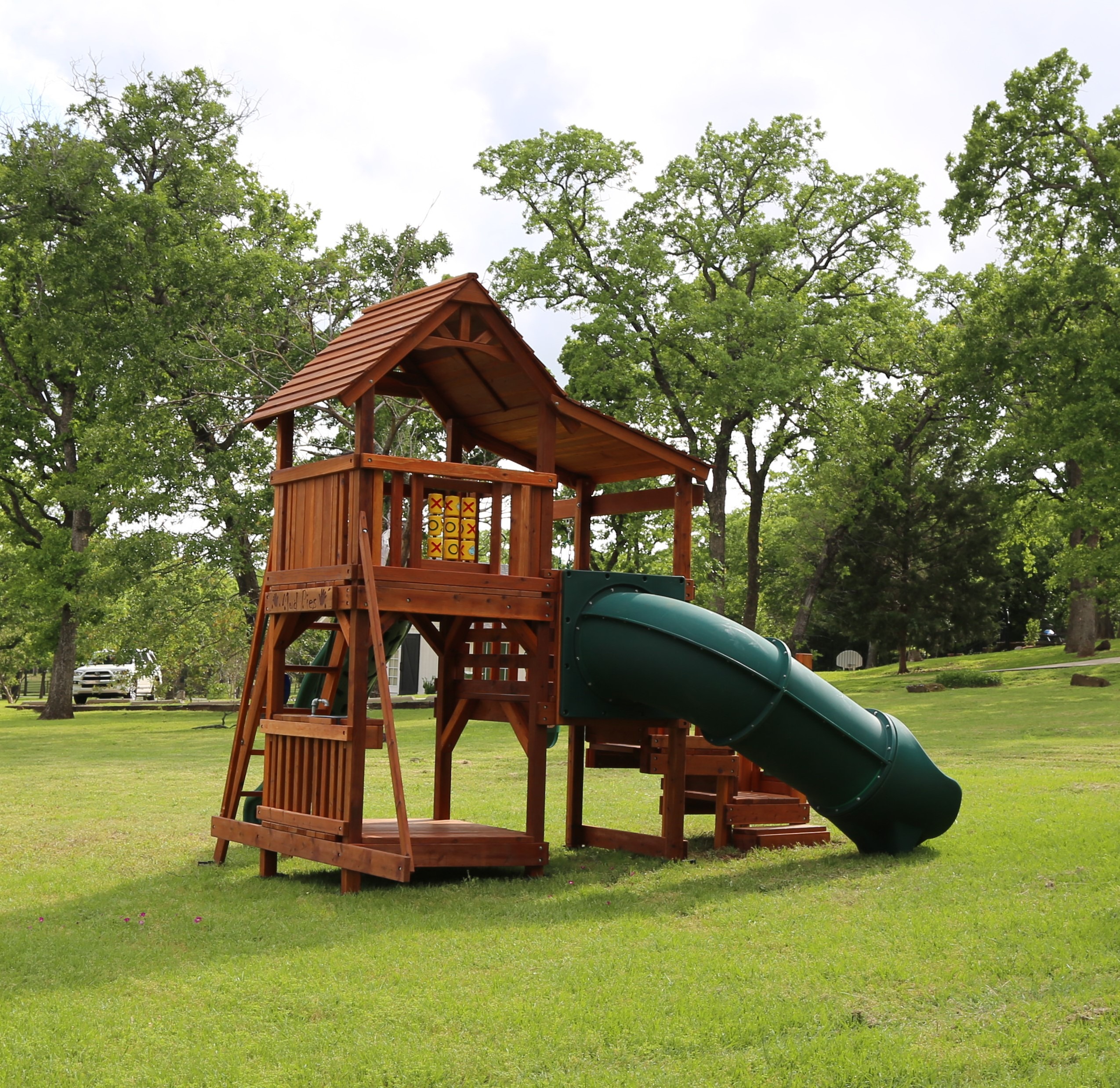 fort davis playset with toddler playground with green slide