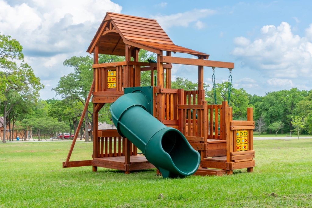Customized backyard playset that has grown as the child grew.