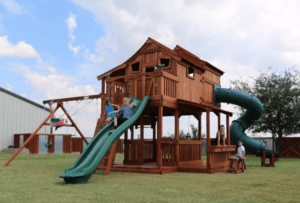 Backyard Fun Factory plasets tempt the kids to play with Cabin Forts, spiral slides