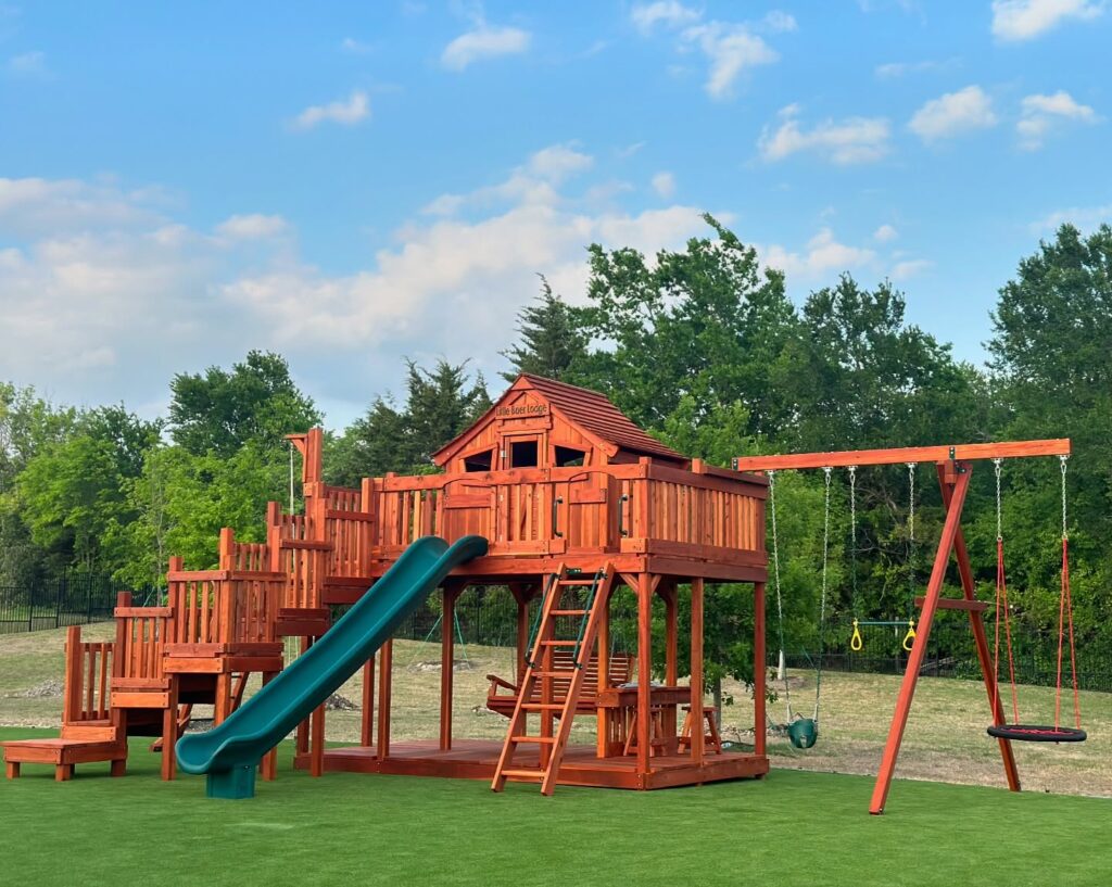 Fort stockton redwood playset with wrap upper deck, platform steps, slide, and swings