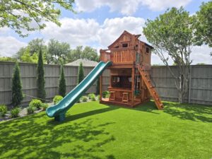 Fort Stockton playset with upper cabin and lower cabin and built in lemonade counter.
