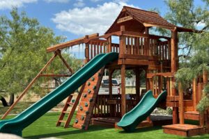 Fort Stockton playset connected to toddler trainer playset