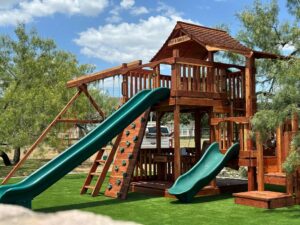 Fort Stockton playset connected to toddler trainer playset