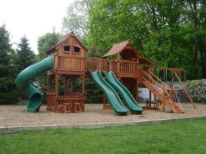 Redwood playsets draw kids to unplug the electronics and come play.