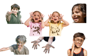 Kids with messy hands and faces having fun.