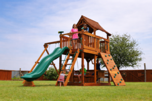 Active children learn better, play helps with focus and reduces stress. copper canyon, maverick swing set, fun deck, picnic table, rock wall