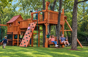 A family uses their Backyard Fun Factory family fun playset.
